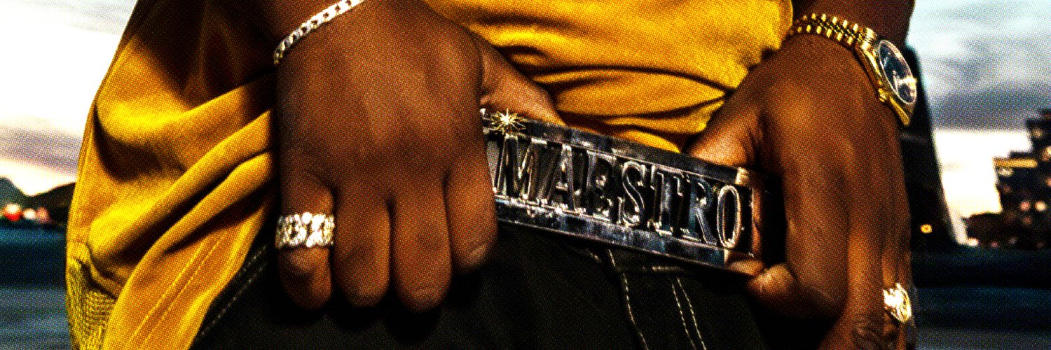 K, LE MAESTRO's banner