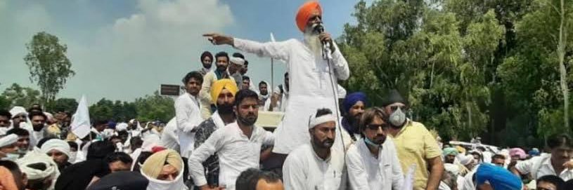 Gurnam Singh Charuni's banner