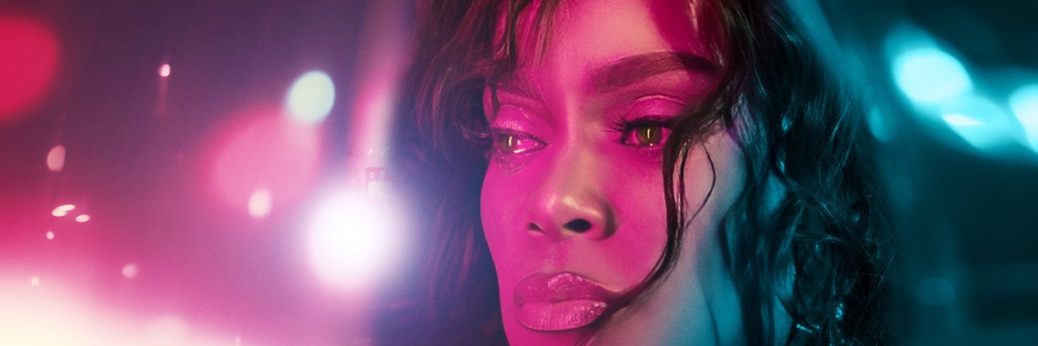 Andra Day's banner