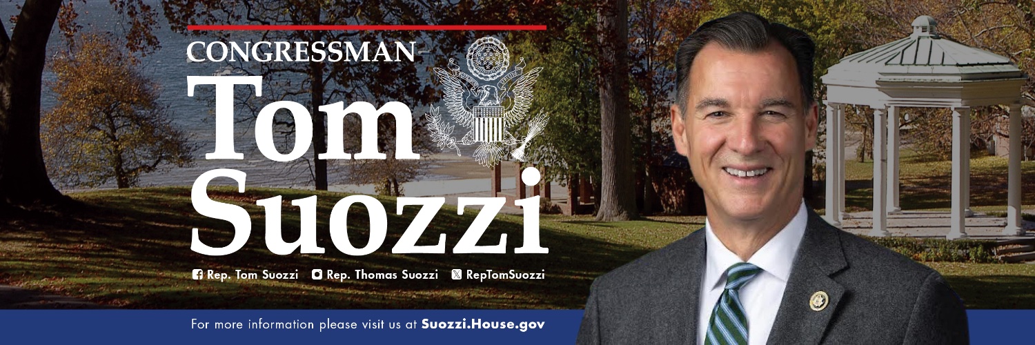 Tom Suozzi's banner