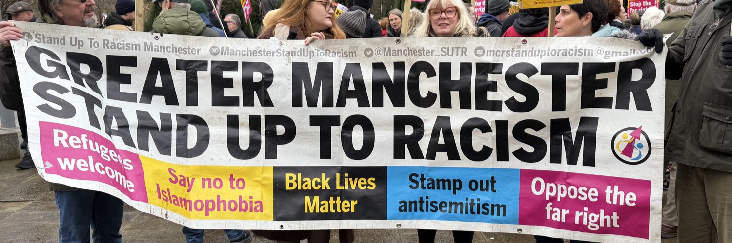 Manchester Stand Up To Racism's banner