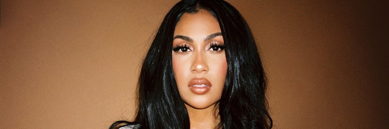 Queen Naija's banner