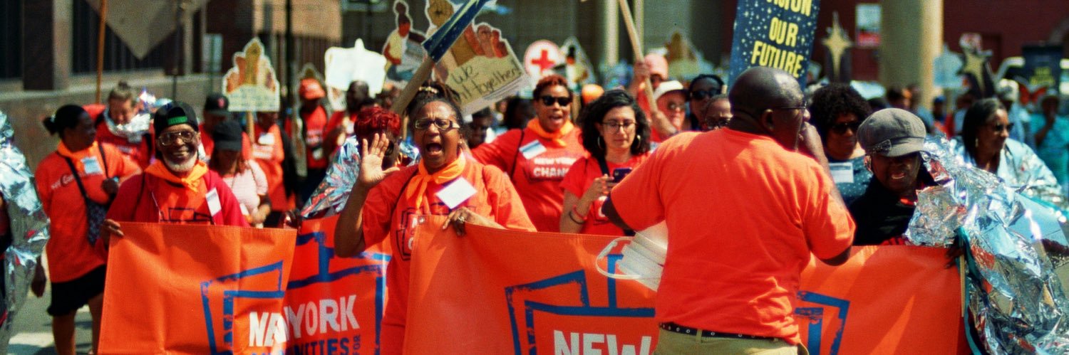 New York Communities for Change's banner