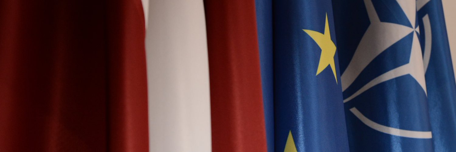 Krišjānis Kariņš's banner