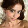 rose-colored girl's profile picture