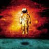 Фото профиля astronaut floating over water with fire behind him
