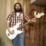 The bearded men's profile picture