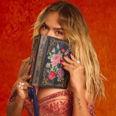 Access Karol G's profile picture